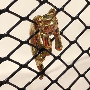 Dangling cat (through the ear) earring single gold tone signed E8J